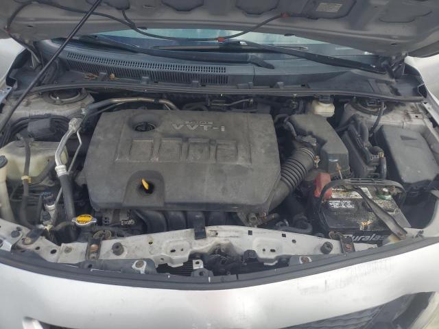 1NXBU40E09Z149574 - 2009 TOYOTA COROLLA BASE Silber Foto 11