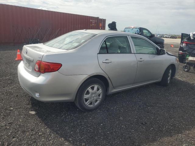 1NXBU40E09Z149574 - 2009 TOYOTA COROLLA BASE Silber Foto 3