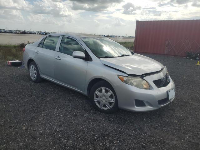 1NXBU40E09Z149574 - 2009 TOYOTA COROLLA BASE Silber Foto 4