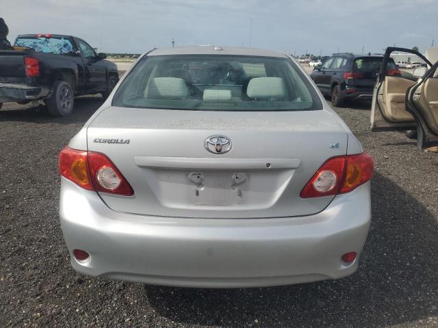 1NXBU40E09Z149574 - 2009 TOYOTA COROLLA BASE Silber Foto 6