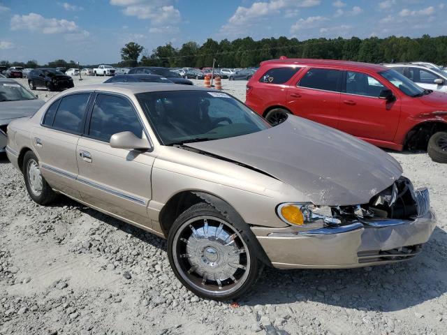 1LNFM97V2WY690425 - 1998 LINCOLN CONTINENTA GOLD photo 4