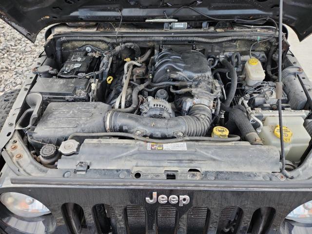 1C4HJWDG2CL262616 - 2012 JEEP WRANGLER U SPORT Schwarz Foto 11