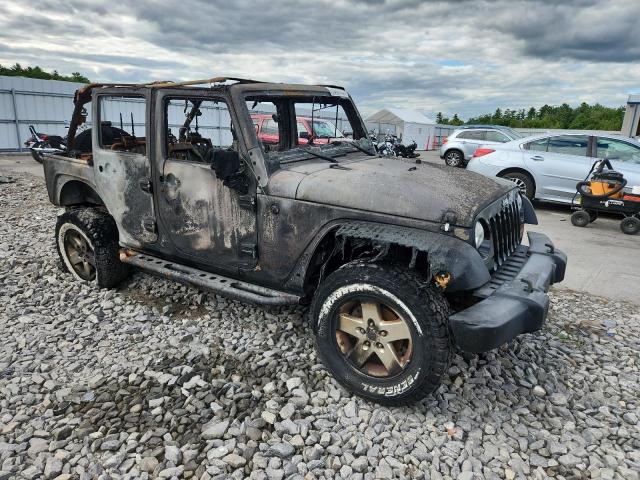 1C4HJWDG2CL262616 - 2012 JEEP WRANGLER U SPORT Schwarz Foto 4