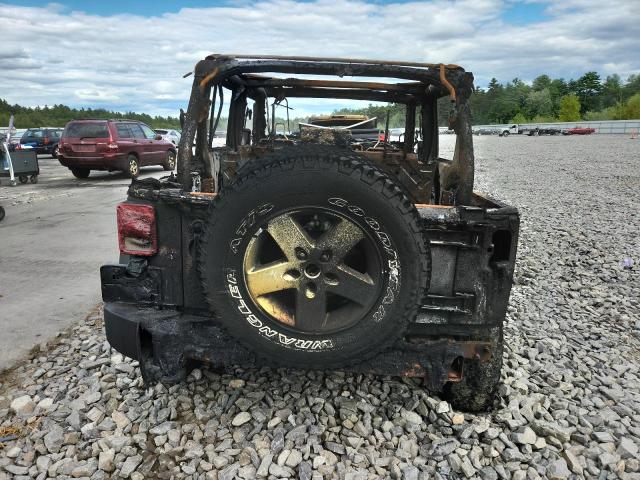 1C4HJWDG2CL262616 - 2012 JEEP WRANGLER U SPORT Schwarz Foto 6