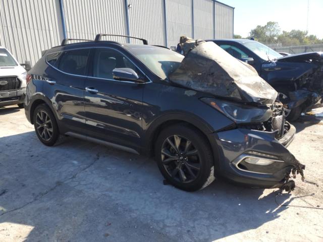 5XYZW4LA4HG384369 - 2017 HYUNDAI SANTA FE S GRAY photo 4