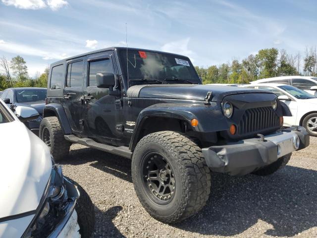 1J4GA59108L524189 - 2008 JEEP WRANGLER U SAHARA BLACK photo 4