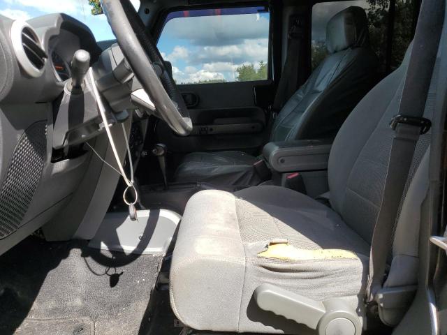 1J4GA59108L524189 - 2008 JEEP WRANGLER U SAHARA BLACK photo 7