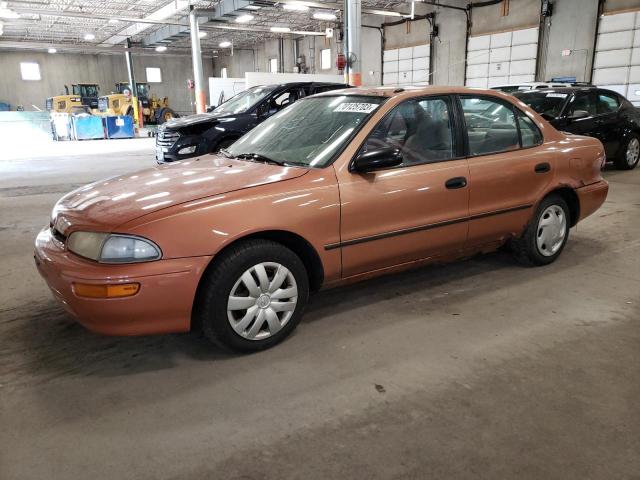 1Y1SK5267VZ423187 - 1997 GEO PRIZM BASE ORANGE photo 1