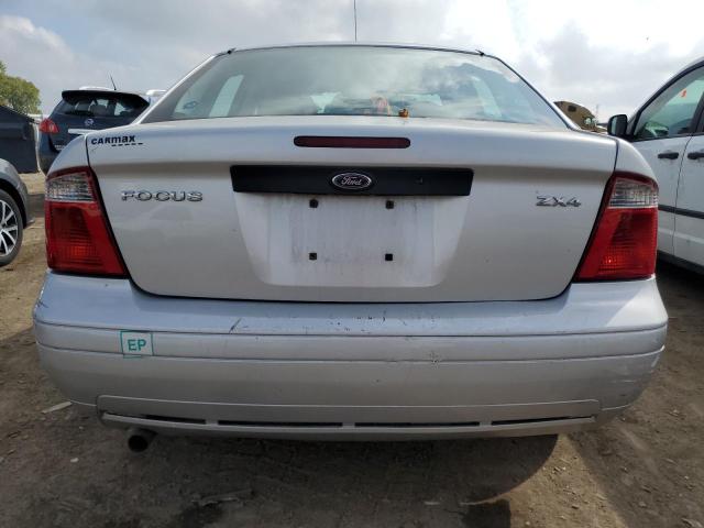 1FAFP34N56W101334 - 2006 FORD FOCUS ZX4 SILVER photo 6