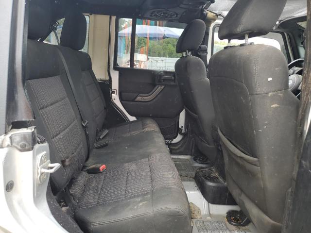 1C4BJWDG7CL182721 - 2012 JEEP WRANGLER U SPORT Plata foto 11