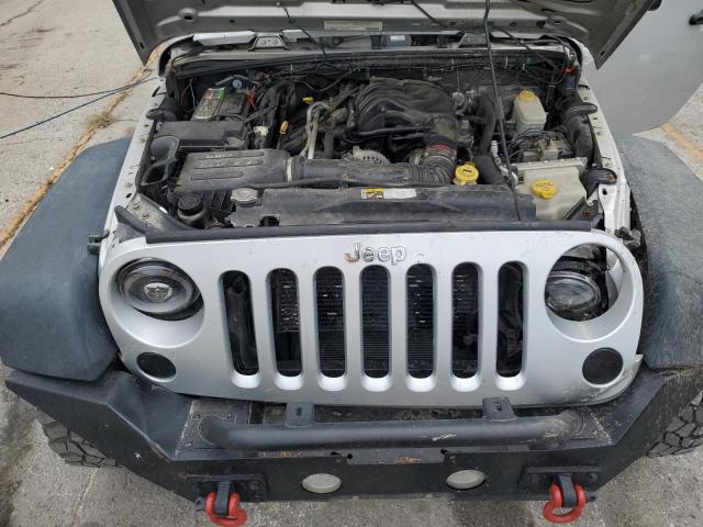 1C4BJWDG7CL182721 - 2012 JEEP WRANGLER U SPORT Plata foto 12