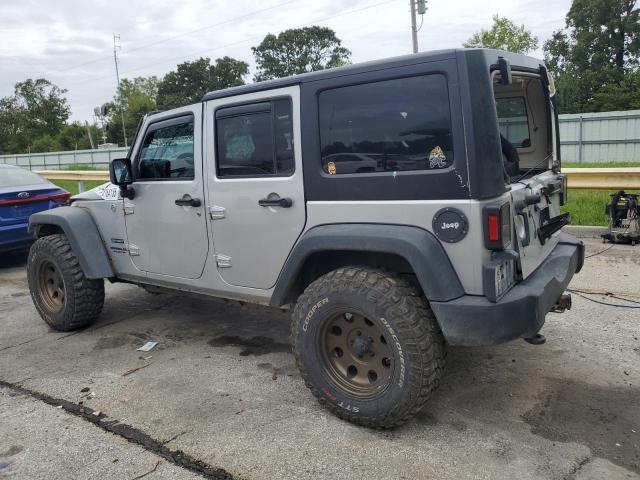 1C4BJWDG7CL182721 - 2012 JEEP WRANGLER U SPORT Plata foto 2