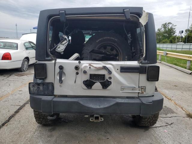 1C4BJWDG7CL182721 - 2012 JEEP WRANGLER U SPORT Plata foto 6