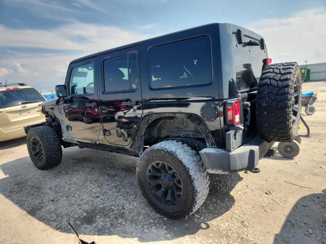 1C4BJWEG9EL223349 - 2014 JEEP WRANGLER U SAHARA BLACK photo 2