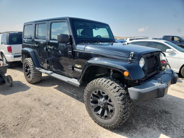 1C4BJWEG9EL223349 - 2014 JEEP WRANGLER U SAHARA BLACK photo 4