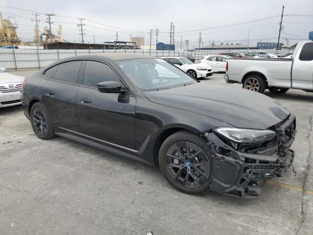 WBY43AW07PFR39691 - 2023 BMW I4 EDRIVE 35 BLACK photo 4