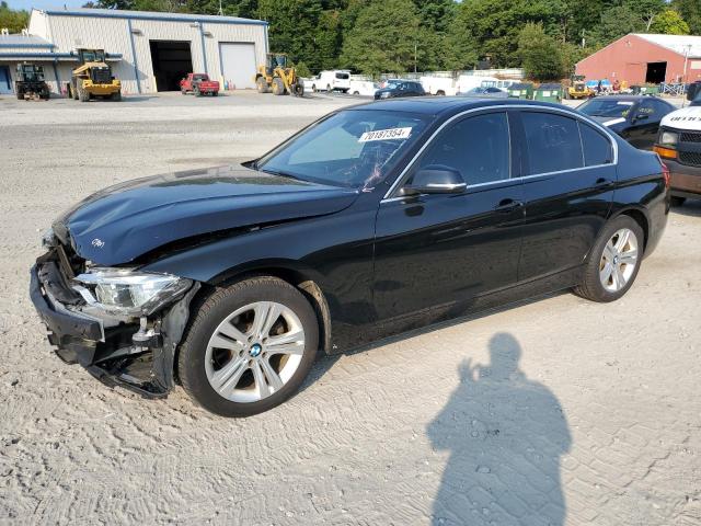 WBA8D9G34HNU65596 - 2017 BMW 330 XI أسود صورة 1