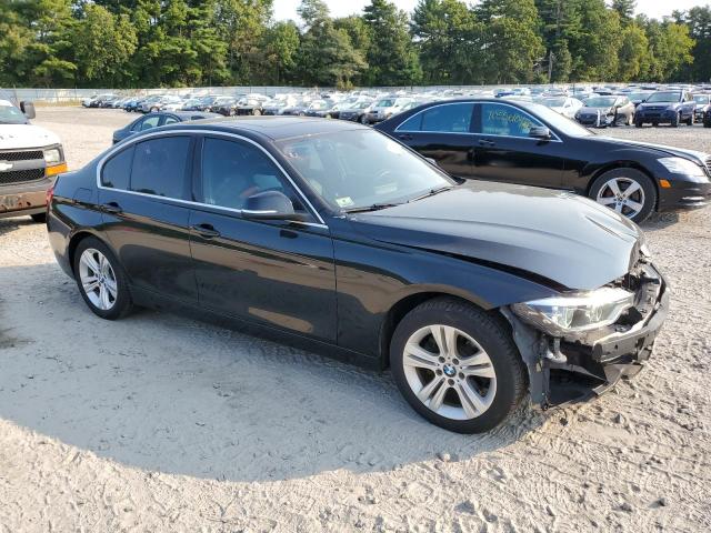 WBA8D9G34HNU65596 - 2017 BMW 330 XI أسود صورة 4