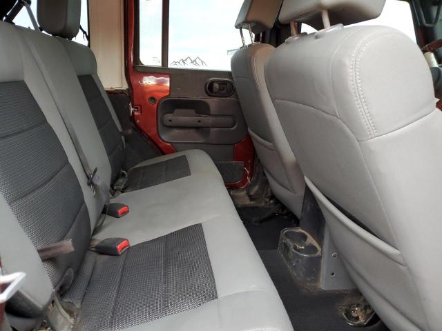 1J4BA5H13AL146239 - 2010 JEEP WRANGLER UNLIMITED SAHARA MAROON photo 11