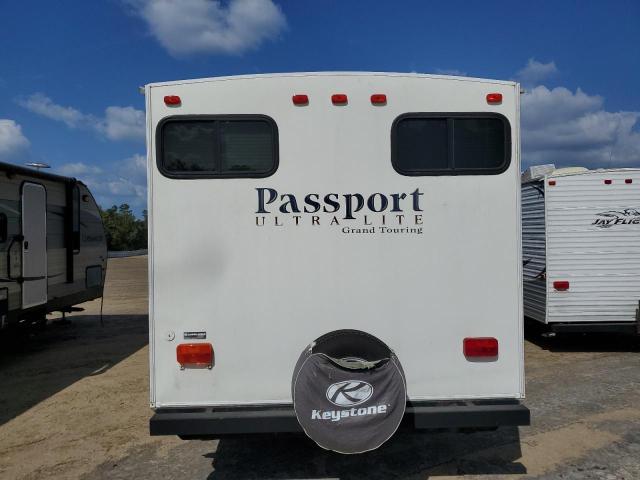 4YDT29127BD410928 - 2011 KEYSTONE PASSPORT G WHITE photo 6