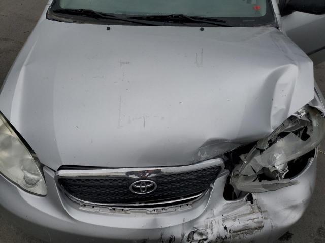 JTDBR32E060083902 - 2006 TOYOTA COROLLA CE ვერცხლისფერი ფოტო 11