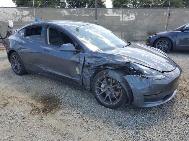 5YJ3E1EB6PF392363 - 2023 TESLA MODEL 3 Серый фото 4