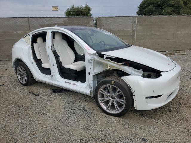 7SAYGDEE7NF553069 - 2022 TESLA MODEL Y Weiß Foto 4