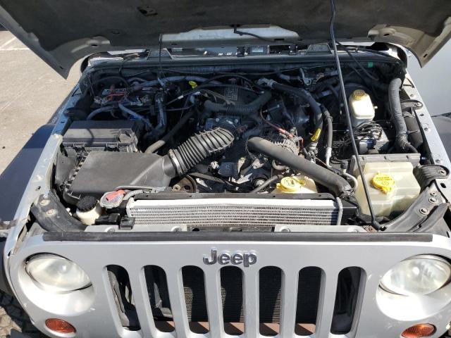 1J4BA5H16BL521963 - 2011 JEEP WRANGLER U SAHARA SILVER photo 11