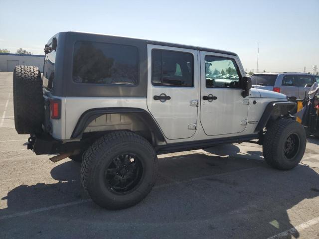 1J4BA5H16BL521963 - 2011 JEEP WRANGLER U SAHARA SILVER photo 3