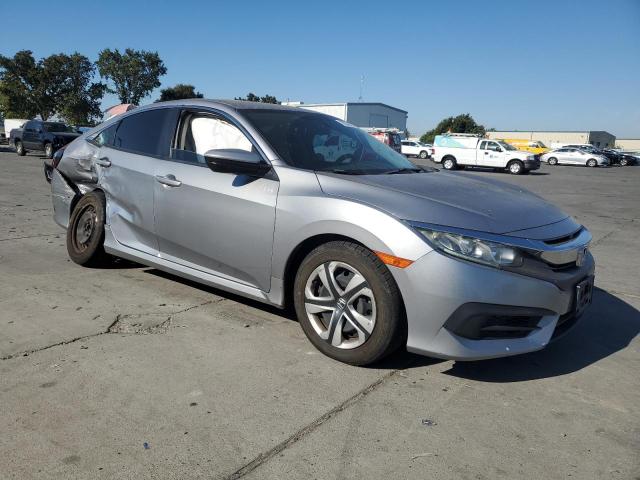 2HGFC2F55JH557243 - 2018 HONDA CIVIC LX SILVER photo 4