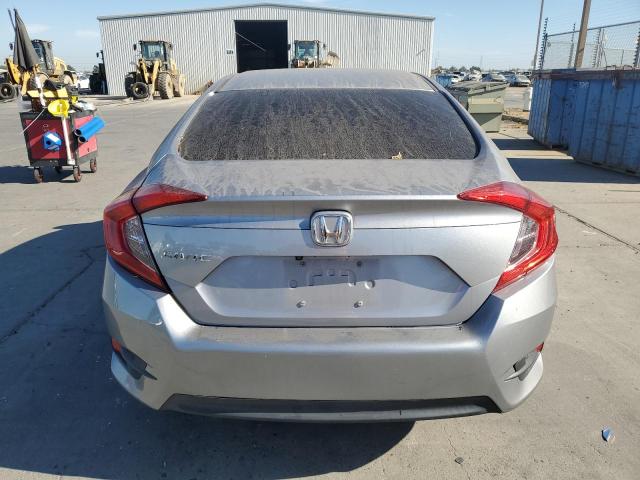 2HGFC2F55JH557243 - 2018 HONDA CIVIC LX SILVER photo 6