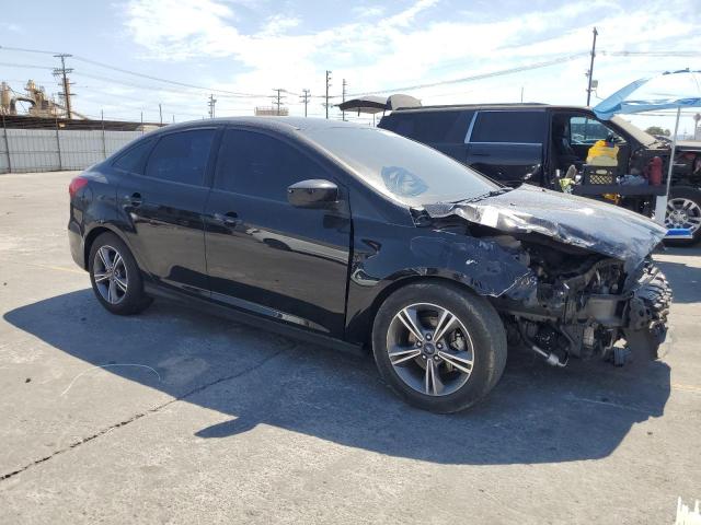 1FADP3FEXJL313161 - 2018 FORD FOCUS SE შავი ფოტო 4