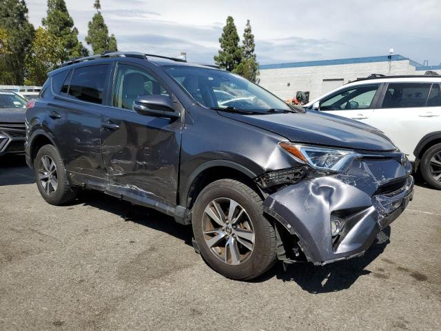 JTMWFREVXHJ106401 - 2017 TOYOTA RAV4 XLE GRAY photo 4