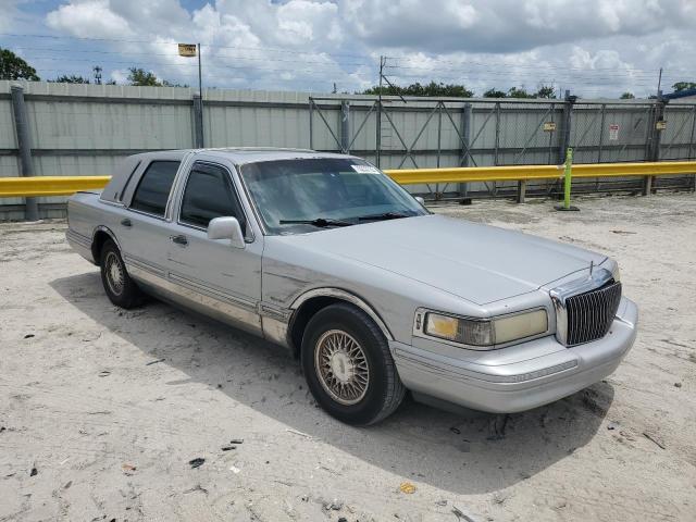 1LNLM82W0VY733283 - 1997 LINCOLN TOWN CAR SIGNATURE 银色 照片 4