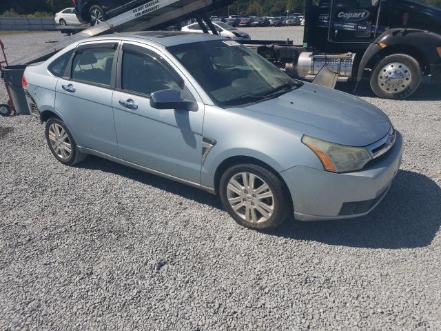 1FAHP37N69W233978 - 2009 FORD FOCUS SEL BLUE photo 4