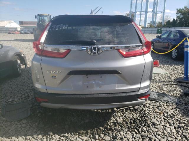 2HKRW5H30JH409413 - 2018 HONDA CR-V LX SILVER photo 6