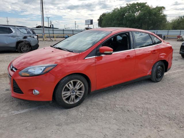 1FAHP3H23CL386721 - 2012 FORD FOCUS SEL RED photo 1