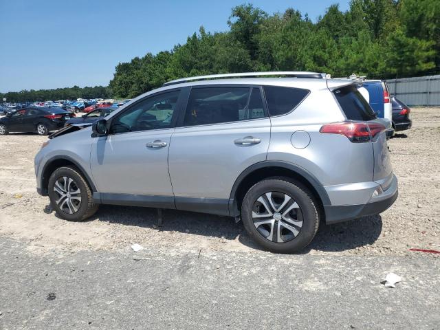2T3ZFREV8GW283977 - 2016 TOYOTA RAV4 LE SILVER photo 2