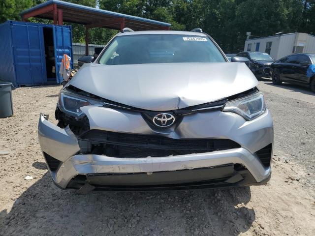2T3ZFREV8GW283977 - 2016 TOYOTA RAV4 LE SILVER photo 5