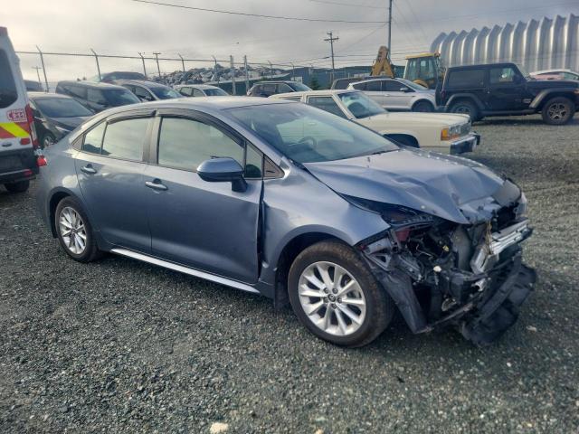 5YFBPMBE2NP346486 - 2022 TOYOTA COROLLA LE BLUE photo 4