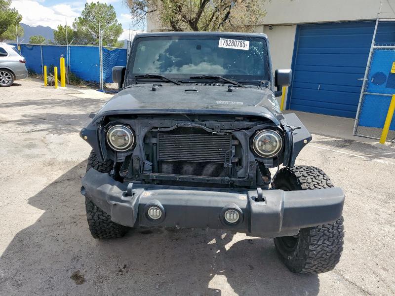 1C4BJWDG1CL218869 - 2012 JEEP WRANGLER UNLIMITED SPORT BLACK photo 5