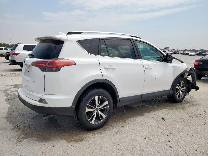 2T3ZFREV7GW304804 - 2016 TOYOTA RAV4 LE WHITE photo 3