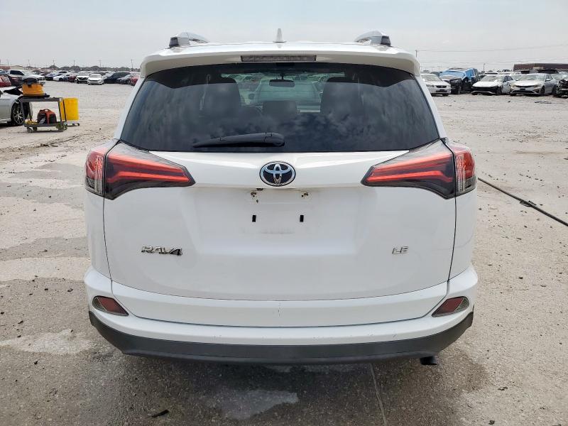 2T3ZFREV7GW304804 - 2016 TOYOTA RAV4 LE WHITE photo 6