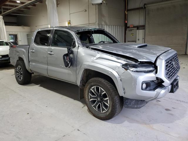 3TMCZ5AN8PM603571 - 2023 TOYOTA TACOMA DOUBLE CAB SILVER photo 4
