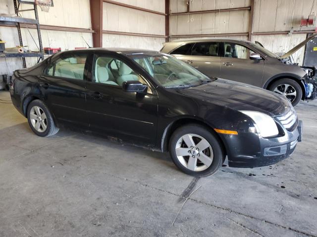 3FAHP07169R196185 - 2009 FORD FUSION SE BLACK photo 4