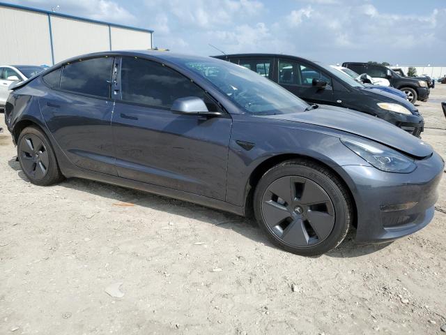 5YJ3E1EA9PF624039 - 2023 TESLA MODEL 3 CHARCOAL photo 4