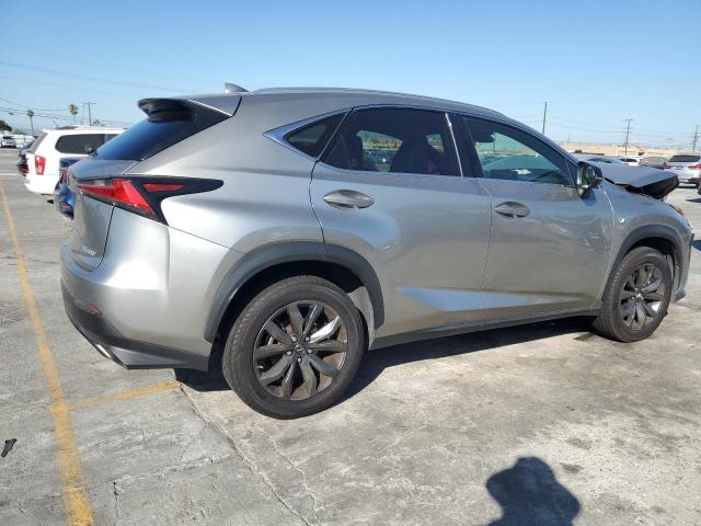 JTJYARBZ9K2120982 - 2019 LEXUS NX 300 BASE Srebrny zdjęcie 3
