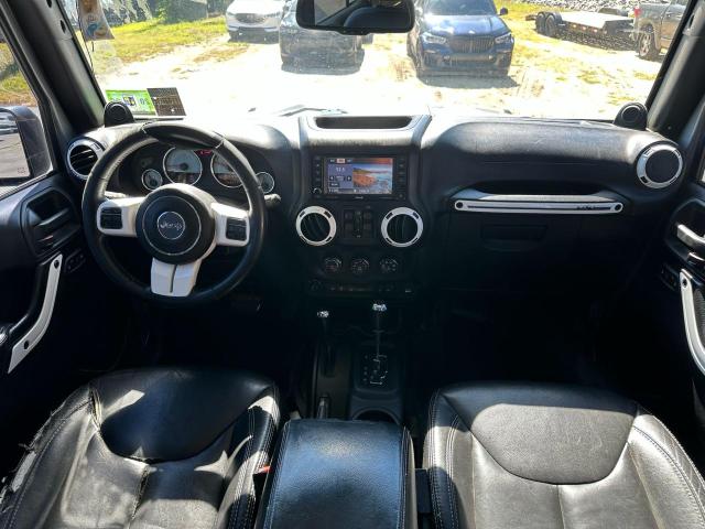 1C4HJWEGXEL236766 - 2014 JEEP WRANGLER U SAHARA SILVER photo 9