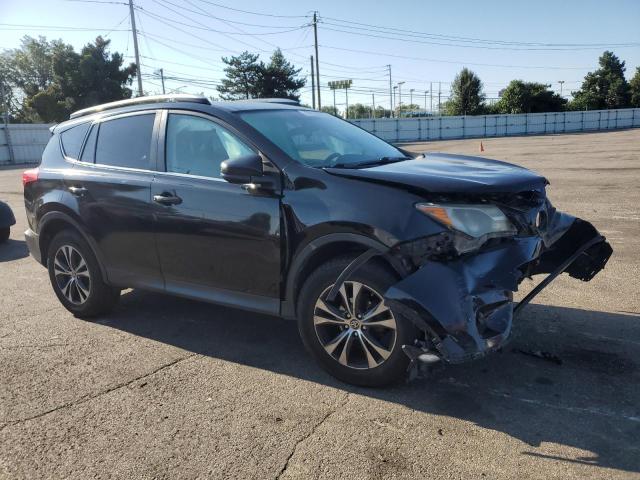 2T3ZFREV1EW096870 - 2014 TOYOTA RAV4 LE BLACK photo 4