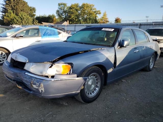 1LNHM81W4XY717727 - 1999 LINCOLN TOWN CAR EXECUTIVE GRAY photo 1
